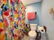 Compact bathroom featuring a colorful shower curtain and all essential fixtures at 12508 N Jackley Rd, Elwood, IN 46036