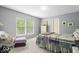 A serene bedroom featuring carpet, windows and a ceiling fan at 12624 Majestic Way, Fishers, IN 46037