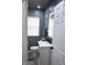 This bathroom features a modern vanity, toilet, and hardwood floors at 1331 N Berwick Ave, Indianapolis, IN 46222