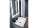This bathroom features a modern vanity, modern faucet, and lighting at 1331 N Berwick Ave, Indianapolis, IN 46222