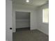 Well-lit bedroom with new flooring and a closet, offering ample storage at 1352 W 22Nd St, Indianapolis, IN 46202