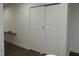 Hallway closet features double doors, adding functionality to this interior space at 1352 W 22Nd St, Indianapolis, IN 46202