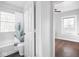 Hallway bathroom with tub and shower and access to a bedroom at 1617 E 52Nd St, Indianapolis, IN 46205