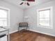 Bedroom with hardwood floors and two windows at 1617 E 52Nd St, Indianapolis, IN 46205
