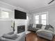 Living room view highlighting the fireplace and TV at 1617 E 52Nd St, Indianapolis, IN 46205