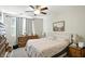 Inviting bedroom with natural light, ceiling fan, and neutral decor at 17233 Gunther Blvd # 102B, Westfield, IN 46074