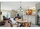 Charming dining area open to the living room and kitchen, perfect for casual Gathering meals and entertaining at 17233 Gunther Blvd # 102B, Westfield, IN 46074