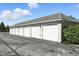 Row of detached garages offering ample parking and storage for residents and guests at 17233 Gunther Blvd # 102B, Westfield, IN 46074