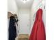 Cozy hallway with coat rack and white door, offering a welcoming entrance into the home at 17233 Gunther Blvd # 102B, Westfield, IN 46074