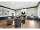 Comfortable lounge area featuring modern seating, a fireplace, and natural light at 17233 Gunther Blvd # 102B, Westfield, IN 46074
