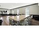 Well-lit meeting room with large tables, chairs, and dark trim, creating a modern aesthetic at 17233 Gunther Blvd # 102B, Westfield, IN 46074