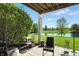 Relaxing patio with serene water views and comfortable seating at 17233 Gunther Blvd # 102B, Westfield, IN 46074