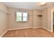 Well-lit bedroom with carpet, featuring a window and a closet with wire shelving at 18726 Tillamook E Run, Noblesville, IN 46062