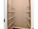 Walk-in closet with multiple white wire shelving units at 18726 Tillamook E Run, Noblesville, IN 46062