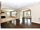 Open floorplan with fireplace flows from living room to adjacent rooms at 18726 Tillamook E Run, Noblesville, IN 46062