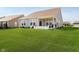 Expansive backyard showing the patio, a privacy fence, and a large lawn at 19581 Sumrall Pl, Westfield, IN 46074