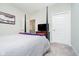 A well-lit main bedroom featuring a four-poster bed and comfortable decor, creating a relaxing space at 19581 Sumrall Pl, Westfield, IN 46074