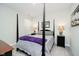 Serene main bedroom with a four-poster bed, soft lighting, and calming neutral color scheme at 19581 Sumrall Pl, Westfield, IN 46074