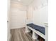 Organized mudroom with built-in bench, coat hooks, and convenient storage for shoes and outerwear at 19581 Sumrall Pl, Westfield, IN 46074