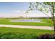 Scenic view of the pond and the well-manicured community landscape at 19581 Sumrall Pl, Westfield, IN 46074