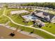 Aerial view of community pool and recreation center featuring lounge seating and outdoor dining space at 19581 Sumrall Pl, Westfield, IN 46074