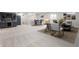 Finished basement with a cozy seating area, dining space, and stylish bar, ideal for relaxing and entertaining at 19987 Old Dock Rd, Westfield, IN 46074
