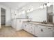 Modern bathroom with a glass-enclosed shower and double vanity with sleek fixtures at 19987 Old Dock Rd, Westfield, IN 46074