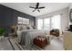 Serene bedroom with a plush bed, modern decor, and large windows offering plenty of natural light at 19987 Old Dock Rd, Westfield, IN 46074