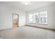 Well-lit bedroom with carpeted floors and large windows offering bright natural light at 19987 Old Dock Rd, Westfield, IN 46074
