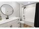 Modern bathroom featuring sleek vanity with black hardware and a shower with a black showerhead fixture at 2223 Ryder Pl, Westfield, IN 46074