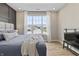 Bright bedroom with large windows overlooking the neighborhood, complemented by a comfortable bed and modern fixtures at 2223 Ryder Pl, Westfield, IN 46074