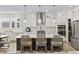 Gourmet kitchen with stainless steel appliances, a large island, and pendant lighting at 2223 Ryder Pl, Westfield, IN 46074