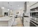 Well-appointed kitchen with stainless steel appliances and adjacent dining area at 2223 Ryder Pl, Westfield, IN 46074
