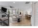 Open concept living room with a fireplace, large windows, and comfortable seating at 2223 Ryder Pl, Westfield, IN 46074