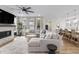 Inviting living room features a modern fireplace, large windows, and comfortable seating at 2223 Ryder Pl, Westfield, IN 46074