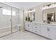 This main bathroom offers double vanity and a large glass enclosed shower with a built-in bench at 2223 Ryder Pl, Westfield, IN 46074
