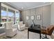 Bright office featuring a large window, modern furnishings, and gray accent wall at 2223 Ryder Pl, Westfield, IN 46074