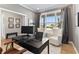 Bright office featuring a large window, modern furnishings, and gray accent wall at 2223 Ryder Pl, Westfield, IN 46074