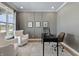 Bright office featuring a large window, modern furnishings, and gray accent wall at 2223 Ryder Pl, Westfield, IN 46074