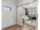 Bright home office with barn door, neutral walls, stylish furniture, and a serene workspace at 2223 Ryder Pl, Westfield, IN 46074