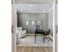 Modern home office featuring stylish decor, comfortable seating, and a sleek desk setup for productivity at 2223 Ryder Pl, Westfield, IN 46074