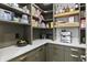 Spacious walk-in pantry with ample storage, open shelving, sleek cabinets, and quartz countertops at 2223 Ryder Pl, Westfield, IN 46074