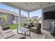 Covered outdoor living space provides a comfortable spot for relaxing and dining at 2223 Ryder Pl, Westfield, IN 46074