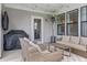 Comfortable backyard porch with a grill, heater, and cushioned seating for comfort at 2223 Ryder Pl, Westfield, IN 46074
