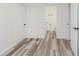 A bedroom leads to a bright bathroom, offering a private, functional, and clean living space at 233 N Devon Ave, Indianapolis, IN 46219