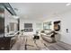 Bright living room with modern furnishings, neutral tones, and stylish decor at 233 N Devon Ave, Indianapolis, IN 46219