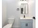 Cozy bathroom with modern sink, toilet, and fixtures in light colors at 2531 E Brookside Ave, Indianapolis, IN 46218