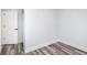 This bedroom has hardwood flooring and fresh paint, ready for your personal touches at 2531 E Brookside Ave, Indianapolis, IN 46218