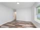 This bedroom has new hardwood flooring, neutral paint and is ready for your personal touch at 2531 E Brookside Ave, Indianapolis, IN 46218