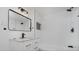 Modern bathroom featuring subway tile, a stylish vanity, and sleek black fixtures at 2631 Collier St, Indianapolis, IN 46241